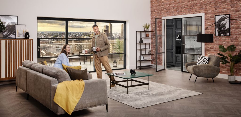 Origin OB-36+ aluminium bi-fold doors in a modern apartment living space